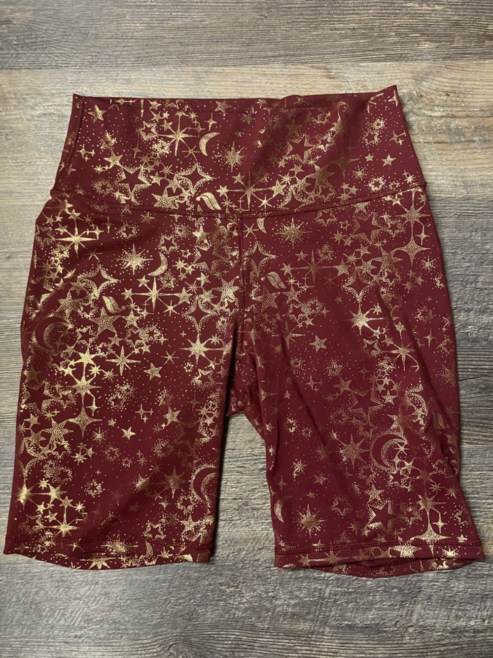 Fabletics Burgundy Bike Shorts with Metallic Gold Celestial Print